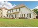 A lovely backyard with a patio, grill, ample seating, and a well-maintained lawn at 3874 Lost Oak Dr, Buford, GA 30519