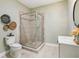 Modern bathroom with glass enclosed shower, stylish fixtures, and neutral color palette at 3874 Lost Oak Dr, Buford, GA 30519