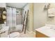 Bathroom showcasing modern fixtures, a shower, and a decorative ladder for displaying towels at 3874 Lost Oak Dr, Buford, GA 30519