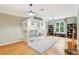 Spacious bedroom featuring custom bunk beds, hardwood floors, and recessed lighting at 3874 Lost Oak Dr, Buford, GA 30519