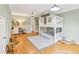 Spacious bedroom featuring custom bunk beds, hardwood floors, and recessed lighting at 3874 Lost Oak Dr, Buford, GA 30519