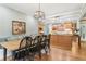 Dining room and eat-in kitchen area with breakfast nook and access to cooking appliances at 3874 Lost Oak Dr, Buford, GA 30519