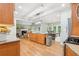 Spacious eat-in kitchen with large island, breakfast area, stainless appliances, and access to living room at 3874 Lost Oak Dr, Buford, GA 30519