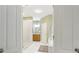 Bright main bathroom featuring dual vanities, a walk-in shower, and a soaking tub at 3874 Lost Oak Dr, Buford, GA 30519
