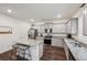 Modern kitchen featuring granite countertops, stainless steel appliances, and a center island at 5320 Flat Rock Pt, Lithonia, GA 30038