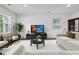 Bright living room with neutral walls, plush seating, and plenty of natural light at 5320 Flat Rock Pt, Lithonia, GA 30038