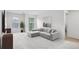 Modern living room features neutral tones, a comfortable couch, and lots of sunlight at 5320 Flat Rock Pt, Lithonia, GA 30038