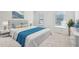 Well-lit primary bedroom featuring a comfortable bed, neutral color scheme and bright windows at 5320 Flat Rock Pt, Lithonia, GA 30038
