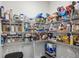 Organized pantry with ample shelving for food storage and a variety of household items at 5320 Flat Rock Pt, Lithonia, GA 30038