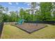 A colorful playground with slides and swings provide outdoor fun for children in this Gathering-friendly community at 5320 Flat Rock Pt, Lithonia, GA 30038