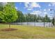 Well-maintained tennis courts provide recreational opportunities for residents to enjoy tennis matches at 5320 Flat Rock Pt, Lithonia, GA 30038