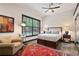 Well-lit bedroom featuring a comfy chair and a stylish bed at 791 Wylie Se St # 807, Atlanta, GA 30316