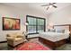 Cozy bedroom with a large window, natural light, and a comfortable bed at 791 Wylie Se St # 807, Atlanta, GA 30316