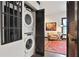 Convenient laundry area adjacent to a stylish sitting room with modern decor at 791 Wylie Se St # 807, Atlanta, GA 30316