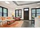 Bright living room featuring large windows, a comfortable couch, and a colorful area rug at 791 Wylie Se St # 807, Atlanta, GA 30316