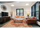 Comfortable living room with hardwood floors, a plush sofa, and stylish decor at 791 Wylie Se St # 807, Atlanta, GA 30316
