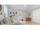 Well-lit living room with neutral colors, a comfortable sofa, and a cozy ambiance at 10 Rockmart Nw Dr, Atlanta, GA 30314