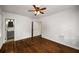 Bedroom showing hardwood floors and connecting bath at 1150 Kennesaw Due West Nw Rd, Kennesaw, GA 30152