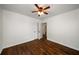 Bedroom showcasing wood floors and an open doorway to another room at 1150 Kennesaw Due West Nw Rd, Kennesaw, GA 30152