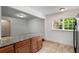 Charming kitchen features granite countertops, stainless appliances, and bright natural light at 1150 Kennesaw Due West Nw Rd, Kennesaw, GA 30152