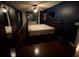 Bedroom with hardwood floors, a bedframe, and a mirror closet at 3753 Soapstone Rd, Decatur, GA 30034