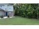 Two-story home featuring a well-manicured lawn and garden at 3753 Soapstone Rd, Decatur, GA 30034