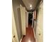 Hallway with hardwood floors leading to the bedroom at 3753 Soapstone Rd, Decatur, GA 30034