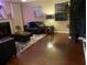Inviting living room features hardwood floors, a cozy fireplace, and stylish furnishings at 3753 Soapstone Rd, Decatur, GA 30034