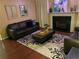 Inviting living room features hardwood floors, a cozy fireplace, and stylish furnishings at 3753 Soapstone Rd, Decatur, GA 30034