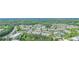Aerial view of the neighborhood showing rows of houses, green spaces, and a pool at 4448 Tacoma Trce, Suwanee, GA 30024