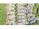 Aerial view of the neighborhood showing streets and rows of houses with green landscaping at 4448 Tacoma Trce, Suwanee, GA 30024