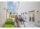 Charming backyard with a swing, concrete patio and double glass doors to the residence at 4448 Tacoma Trce, Suwanee, GA 30024