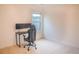 Bright bedroom with a desk and a chair near the window, offering a cozy workspace at 4448 Tacoma Trce, Suwanee, GA 30024