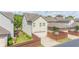 Charming home featuring neutral siding, attached garage, small yard with fence, and well-kept landscaping at 4448 Tacoma Trce, Suwanee, GA 30024