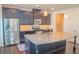 Kitchen featuring stainless steel appliances, granite countertops and a large island at 4448 Tacoma Trce, Suwanee, GA 30024