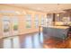 Modern eat-in kitchen with stainless steel appliances, granite countertops, and ample counter space at 4448 Tacoma Trce, Suwanee, GA 30024