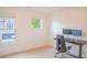Bright office space featuring natural light and a desk setup ideal for remote work at 4448 Tacoma Trce, Suwanee, GA 30024