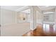 Spacious living room with carpeted floors and architectural columns at 4920 Fourth Rail Ln, Cumming, GA 30040