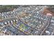 An aerial view highlighting this home in a neighborhood with walking paths and community areas at 1006 Fendley St, Woodstock, GA 30188