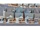 Overhead aerial view of neighborhood homes with gray roofs and colorful exteriors at 1006 Fendley St, Woodstock, GA 30188