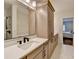 Bathroom with quartz countertops and a modern shower head at 1006 Fendley St, Woodstock, GA 30188