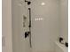 Walk-in shower with white subway tile and a built-in soap niche at 1006 Fendley St, Woodstock, GA 30188