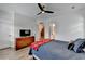 Cozy bedroom boasts natural light, stylish decor, and an inviting atmosphere at 1006 Fendley St, Woodstock, GA 30188