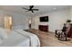Cozy bedroom with a TV and a rocking chair at 1006 Fendley St, Woodstock, GA 30188