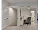 Finished hallway featuring a small work space and view into the bathroom at 1006 Fendley St, Woodstock, GA 30188