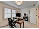 Bright home office features modern decor, natural light, and a comfortable workspace at 1006 Fendley St, Woodstock, GA 30188