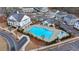 Community pool area featuring a large swimming pool, wading pool, and surrounding amenities for residents at 1006 Fendley St, Woodstock, GA 30188