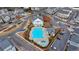 Beautiful community pool area with a large pool, a wading pool, and a gathering pavilion surrounded by residences at 1006 Fendley St, Woodstock, GA 30188