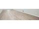 Spacious basement area featuring durable wood-look flooring and light gray painted walls with white trim at 1523 Pangborn Station Dr, Decatur, GA 30033