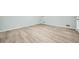 Spacious bedroom with wood-look flooring, neutral paint, and ample natural light at 1523 Pangborn Station Dr, Decatur, GA 30033